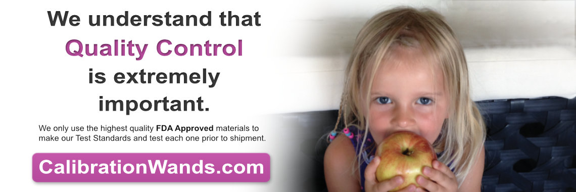 Little girl with blonde hair, eating an apple